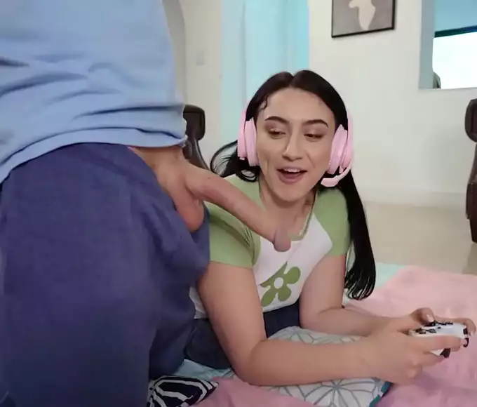 Introducing the Gamer Slut Next Door! Watch as this Luscious Lass Takes on Two Gaming Geeks and Shows Them Her Alluring Moves
