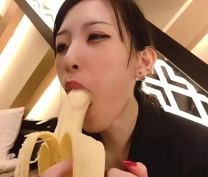 Japanese Amateur Handjob Gives Blowjob To Banana With Condom On